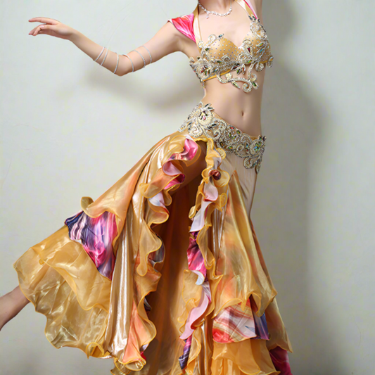 Showcasing high-end Egyptian belly dance costumes with ornate designs. Shop luxurious Badla sets, intricate bra and belt sets, and elaborately decorated outfits. Ideal for performances, our preBaladi and Saidi dancewear collection with traditional Egyptian belly dance outfits. Shop Balady costumes, Saidy costumes, folk dance costumes, oriental dance wear, & professional attire. Find Baladi dresses, Saidi gallabiyahs in a range of styles, sizes, & fabrics ideal for dance practice & performance, free shipping