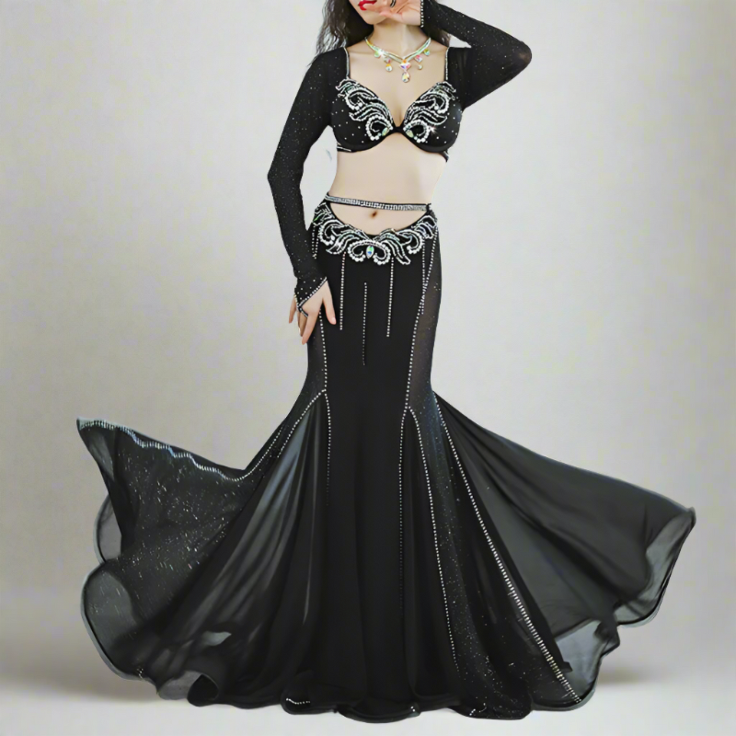 Showcasing high-end Egyptian belly dance costumes with ornate designs. Shop luxurious Badla sets, intricate bra and belt sets, and elaborately decorated outfits. Ideal for performances, our preBaladi and Saidi dancewear collection with traditional Egyptian belly dance outfits. Shop Balady costumes, Saidy costumes, folk dance costumes, oriental dance wear, & professional attire. Find Baladi dresses, Saidi gallabiyahs in a range of styles, sizes, & fabrics ideal for dance practice & performance, free shipping