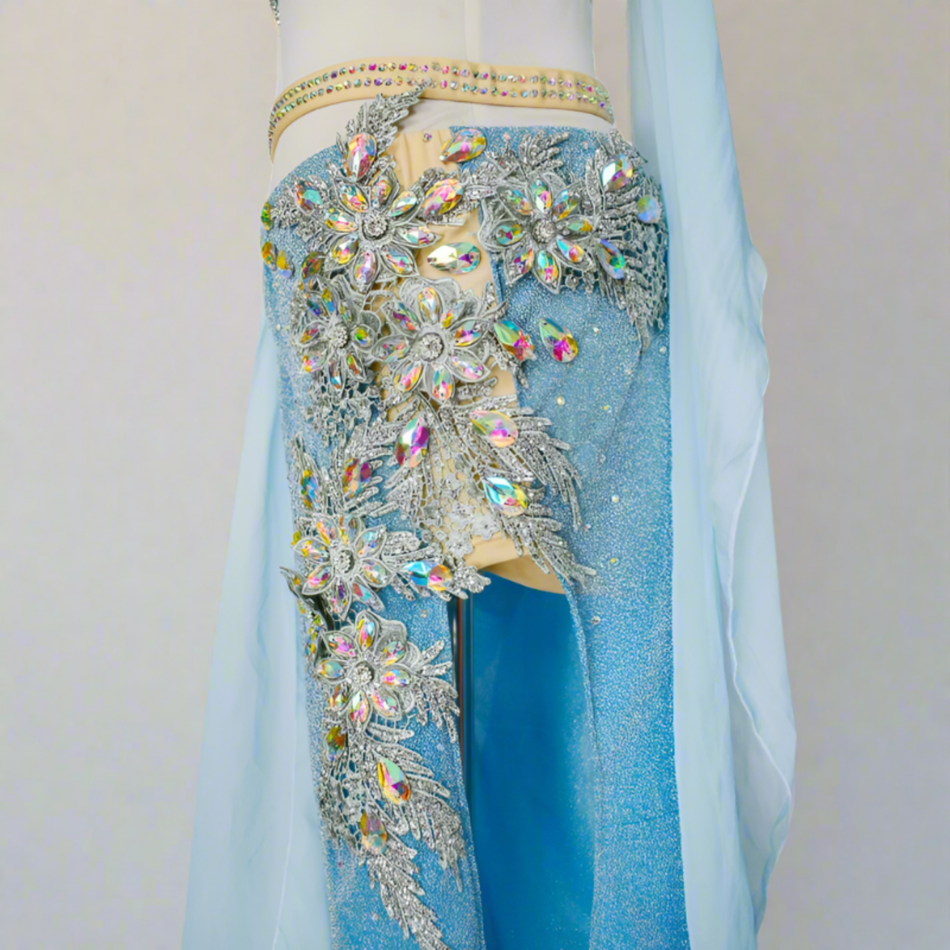 Showcasing high-end Egyptian belly dance costumes with ornate designs. Shop luxurious Badla sets, intricate bra and belt sets, and elaborately decorated outfits. Ideal for performances, our preBaladi and Saidi dancewear collection with traditional Egyptian belly dance outfits. Shop Balady costumes, Saidy costumes, folk dance costumes, oriental dance wear, & professional attire. Find Baladi dresses, Saidi gallabiyahs in a range of styles, sizes, & fabrics ideal for dance practice & performance, free shipping