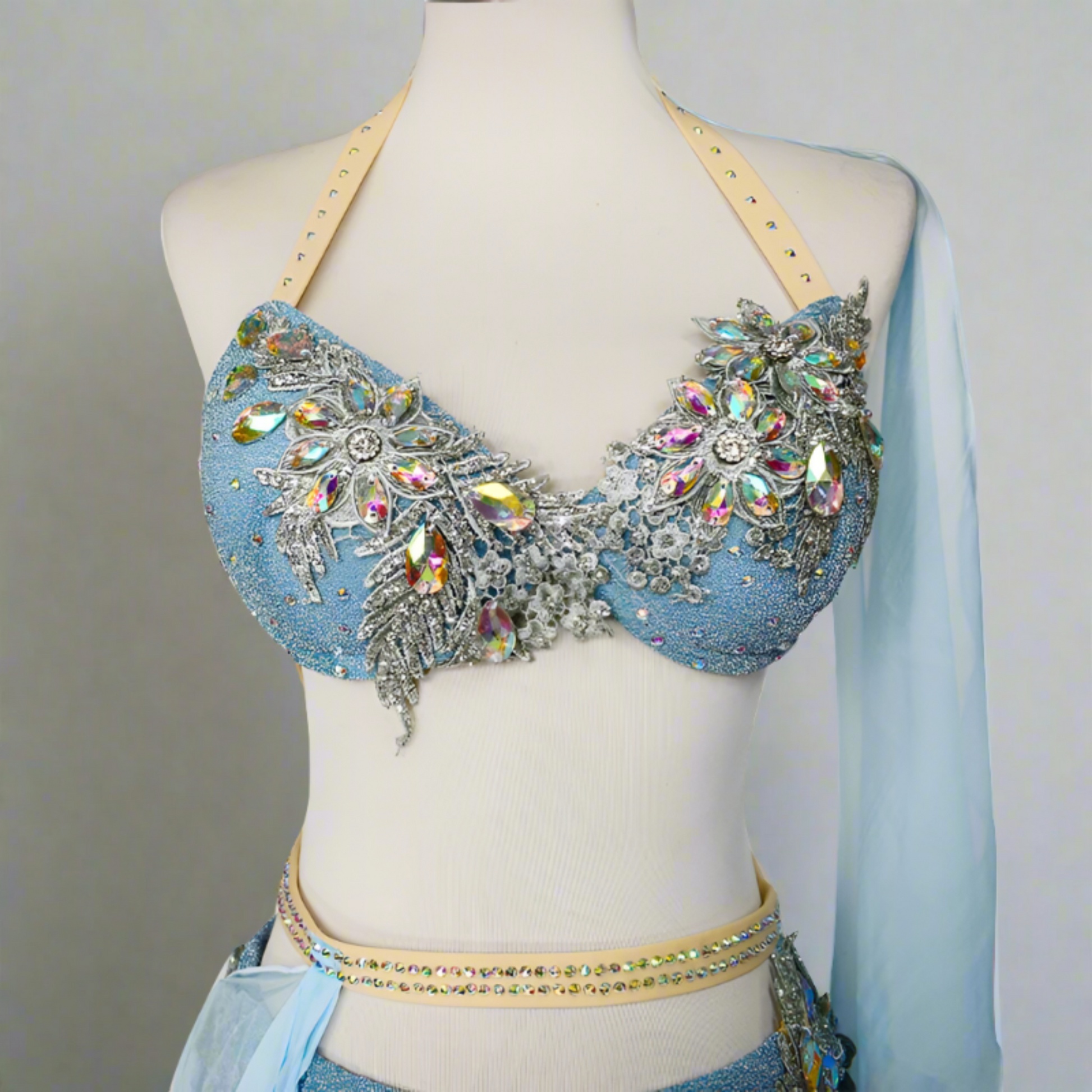 Showcasing high-end Egyptian belly dance costumes with ornate designs. Shop luxurious Badla sets, intricate bra and belt sets, and elaborately decorated outfits. Ideal for performances, our preBaladi and Saidi dancewear collection with traditional Egyptian belly dance outfits. Shop Balady costumes, Saidy costumes, folk dance costumes, oriental dance wear, & professional attire. Find Baladi dresses, Saidi gallabiyahs in a range of styles, sizes, & fabrics ideal for dance practice & performance, free shipping