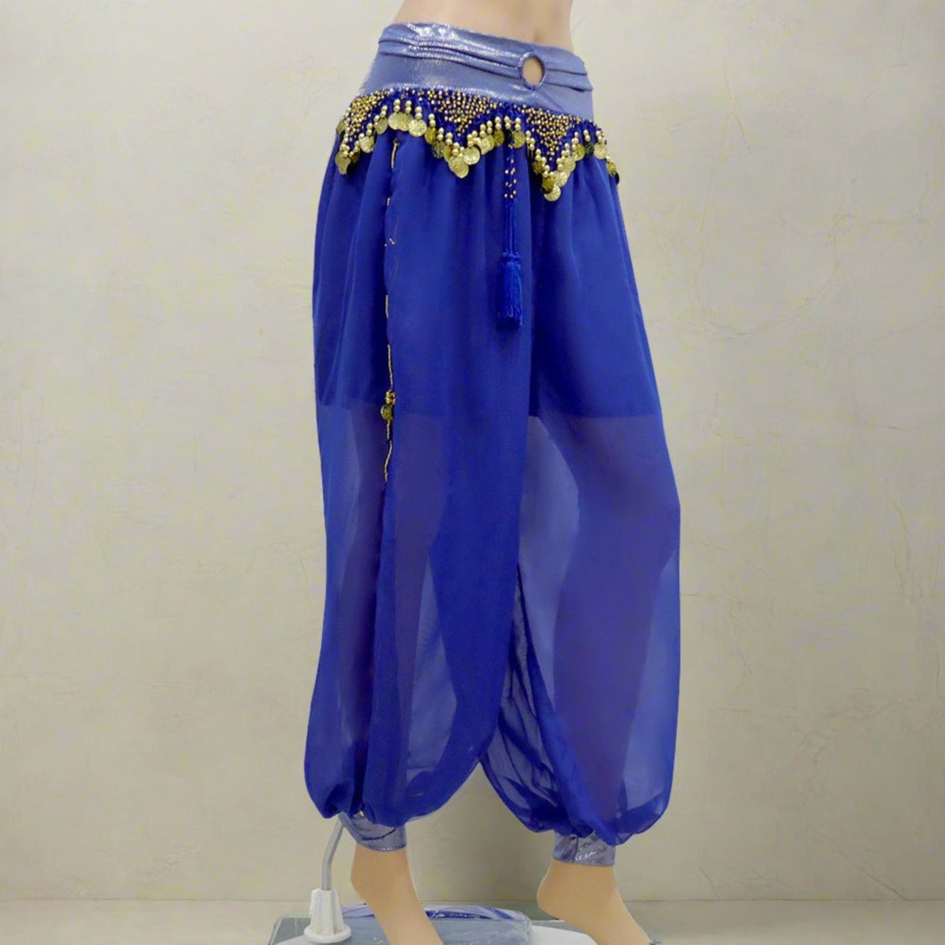 Shop our dance pants collection featuring a variety of styles for belly dance practice and performances. Find comfortable and versatile options including harem pants, yoga pants, and stretch pants. Our selection offers different cuts, colors, and fabrics designed for movement, layering, and a perfect fit for every dancer