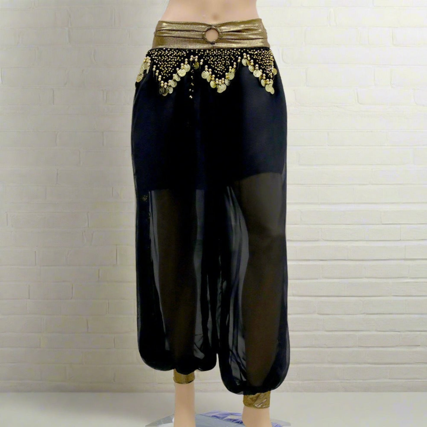 Shop our dance pants collection featuring a variety of styles for belly dance practice and performances. Find comfortable and versatile options including harem pants, yoga pants, and stretch pants. Our selection offers different cuts, colors, and fabrics designed for movement, layering, and a perfect fit for every dancer