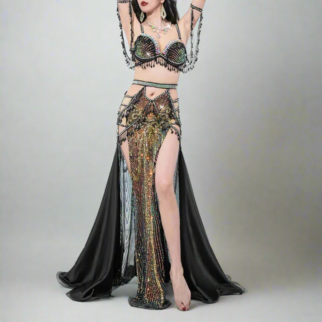 Showcasing high-end Egyptian belly dance costumes with ornate designs. Shop luxurious Badla sets, intricate bra and belt sets, and elaborately decorated outfits. Ideal for performances, our premium collection features exquisite detailing, rich fabrics, and elegant styles for a stunning stage presence