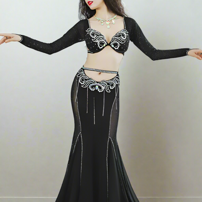 Showcasing high-end Egyptian belly dance costumes with ornate designs. Shop luxurious Badla sets, intricate bra and belt sets, and elaborately decorated outfits. Ideal for performances, our preBaladi and Saidi dancewear collection with traditional Egyptian belly dance outfits. Shop Balady costumes, Saidy costumes, folk dance costumes, oriental dance wear, & professional attire. Find Baladi dresses, Saidi gallabiyahs in a range of styles, sizes, & fabrics ideal for dance practice & performance, free shipping