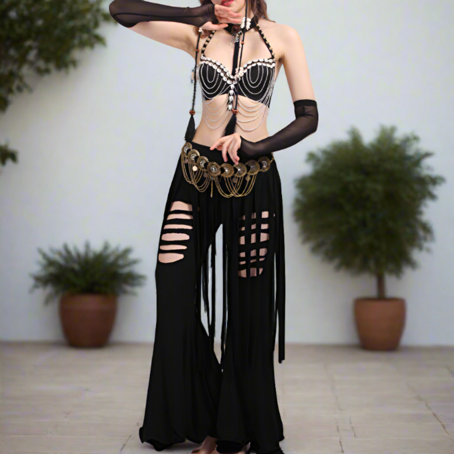 ZURA black halter-style shell top with tasselled bell-bottom pants